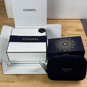 CHANEL Holiday 2025 Packaging & Cosmetic Bag: Navy Blue, Silver & Gold.